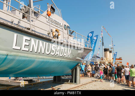 Tallinn Lennusadam, view of Sunday visitors queuing on a summer afternoon to board vintage ships in the Lennusadam Seaplane Harbour, Tallinn, Estonia. Stock Photo