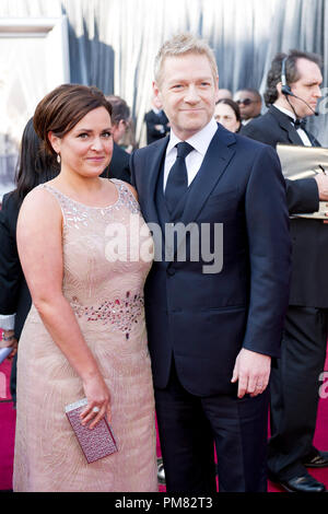 Lindsay Brunnock and Kenneth Branagh, Oscar-nominee for Performance by an Actor in a Supporting Role, arrive for the 84th Annual Academy Awards from Hollywood, CA February 26, 2012. Stock Photo