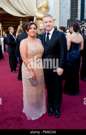 Lindsay Brunnock and Kenneth Branagh, Oscar-nominee for Performance by an Actor in a Supporting Role, arrive for the 84th Annual Academy Awards from Hollywood, CA February 26, 2012. Stock Photo