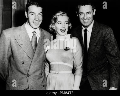 (Archival Classic Cinema - Cary Grant Retrospective) New York Yankees baseball player Joe DiMaggio with his wife, Marilyn Monroe and Cary Grant during the making of 'Monkey Business' 1954  Cinema Publishers Collection   File Reference # 31475 101THA Stock Photo
