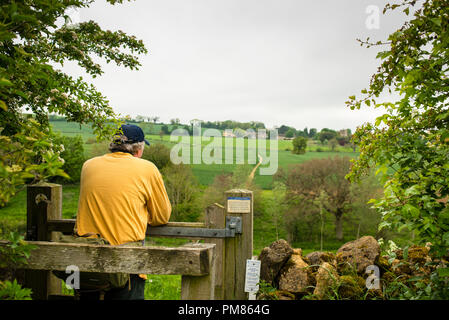 Gate into Guiting Power village  on the Public Footpaths in the Cotswold District of England. Stock Photo