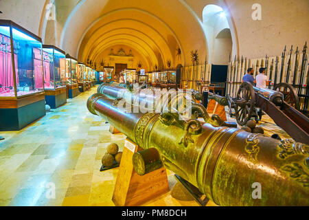 VALLETTA, MALTA - JUNE 17, 2018: Collection of old cannons and crusaders'  spears in Palace Armoury - the arsenal in rear of Grandmaster's Palace, on  Stock Photo