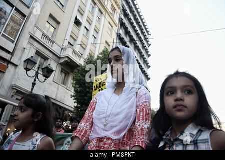 Young girls seen participating during the antifascist march in Athens. Thousands protester took the streets against fascism and racism in Athens. The march was mainly focused on the murder of the rapper Pavlos Fyssas, by a neo-Nazi in the city of Piraeus a couple of years ago. Stock Photo