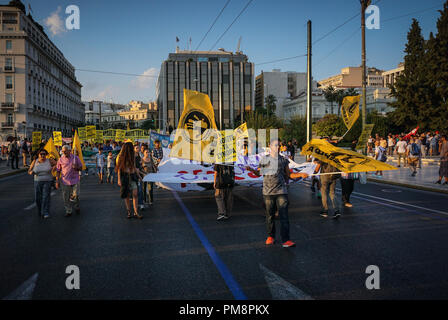 People seen holding flags, banners and posters marching during the protest. Thousands protester took the streets against fascism and racism in Athens. The march was mainly focused on the murder of the rapper Pavlos Fyssas, by a neo-Nazi in the city of Piraeus a couple of years ago. Stock Photo