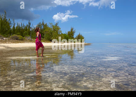 Girl on the beach of Ile aux Benitiers, Mauritius