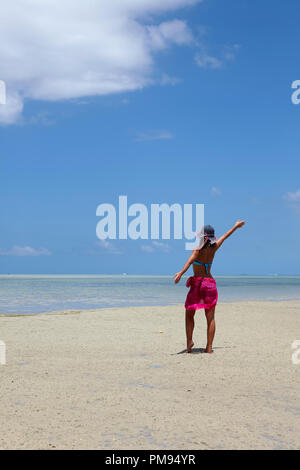 Girl on the beach of Ile aux Benitiers, Mauritius