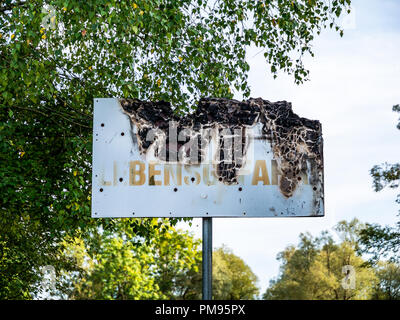 Image of an old burned sign close up Stock Photo