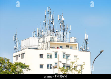 Sao Paulo, Brazil, mai 26, 2018: Several antennas at the top of a building in Sao Paulo city Stock Photo