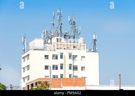 Sao Paulo, Brazil, mai 26, 2018: Several antennas at the top of a building in Sao Paulo city Stock Photo