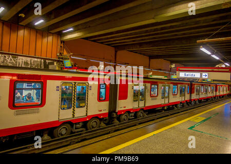 SANTIAGO, CHILE - SEPTEMBER 14, 2018: Unidentified people inside of electric train on central railway station in Santiago, Chile Stock Photo