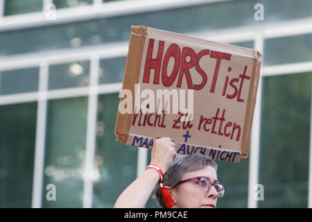 Frankfurt, Germany. 17th September 2018. A protester holds up a sign that reads 'Horst can't be saved'. Around 6.300 protesters marched through Frankfurt, in support of the Seebrucke (Sea Lift) movement for the rescuing of refugees from the Mediterranean Sea. They also protested against the restrictive refugee policies of German Federal Interior Minister Horst Seehofer, who was due to speak at a congress in Frankfurt the following day, but whose appearance was cancelled. Credit: Michael Debets/Alamy Live News Stock Photo