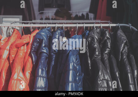 Fashionable jacket in a boutique store Stock Photo