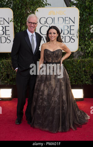 Nominated for BEST PERFORMANCE BY AN ACTRESS IN A TELEVISION SERIES – COMEDY OR MUSICAL for her role in “VEEP”, actress Julia Louis-Dreyfus and husband Brad Hall attend the 70th Annual Golden Globe Awards at the Beverly Hilton in Beverly Hills, CA on Sunday, January 13, 2013. Stock Photo