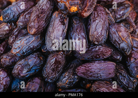 Heap of dried dates close-up. Stock Photo
