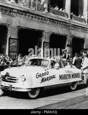 Marilyn Monroe rides in a convertible for a parade as the Grand Marshal Parade for the Miss America Pageant, Atlantic City, New Jersey 1952 File Reference # 32733 415THA Stock Photo