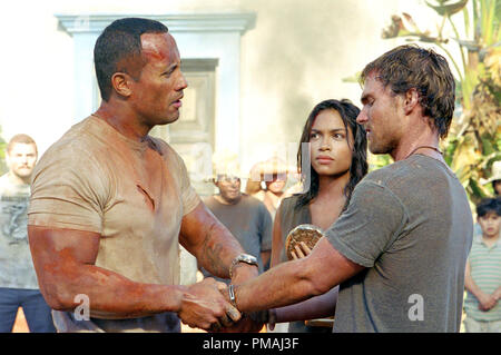 Beck (THE ROCK), Mariana (ROSARIO DAWSON) and Travis (SEANN WILLIAM SCOTT) do their best to get along-and survive-in the action-adventure The Rundown.  2003 Stock Photo