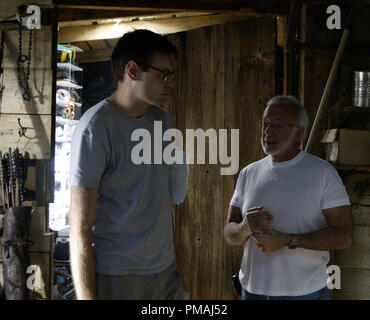 Director Rob Schmidt and producer Stan Winston, a four-time Academy Award® winning character effects artist, confer on the set of  'Wrong Turn' (2003) Stock Photo