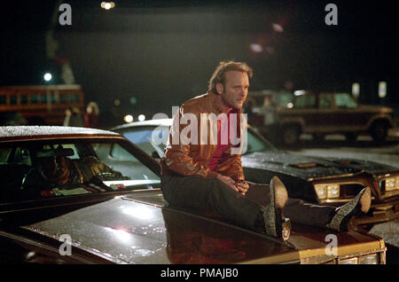 TIM McGRAW as Charlie Billingsley (with GARRETT HEDLUND as Don Billingsley, behind the wheel) in Imagine Entertainment's adaptation of H.G. Bissinger's prize-winning book, Friday Night Lights. (2004) Stock Photo