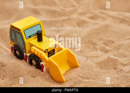 little wood toy excavator Stock Photo