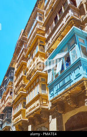 Maltese balconies are important part of local architecture, typical for edifices in every city, town and village of Malta, Valletta. Stock Photo