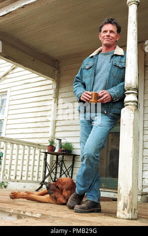 BRUCE GREENWOOD with LIGHTNING the dog, voiced by SNOOP DOGG in Alcon Entertainment's live action / CGI animation family motion picture 'Racing Stripes,' distributed by Warner Bros. Pictures. (2004) Stock Photo