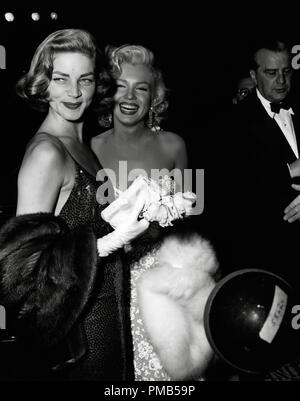 Lauren Bacall and Marilyn Monroe at the premiere of 'How to Marry a Millionaire' circa 1953    File Reference # 33536 450THA Stock Photo