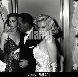 Lauren Bacall, Humphrey Bogart and Marilyn Monroe at the premiere of 'How to Marry a Millionaire' circa 1953  File Reference # 33536 456THA Stock Photo