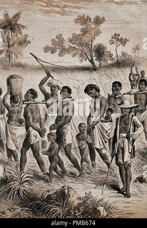 Group of African men, women and children captured and in shackles, are herded by men with whips and guns in order to become slaves. 'Band of captives driven into slavery' Stock Photo