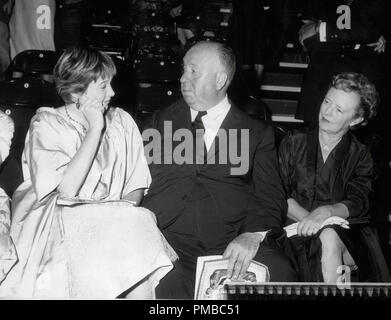 Alfred Hitchcock with his wife Alma (Alma Lucy Reville) and Shirley MacLaine, Circa 1959  File Reference # 32914 518THA Stock Photo