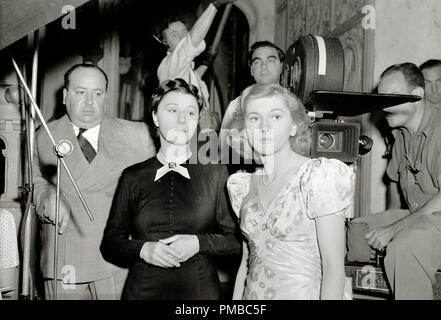 Alfred Hitchcock, Judith Anderson and Joan Fontaine during the making of  'Rebecca' 1940 United Artists  File Reference # 32914 523THA Stock Photo