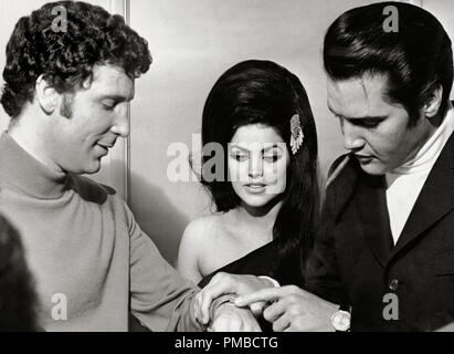 Elvis Presley with his wife Priscilla Presley and singer Tom Jones