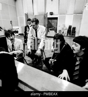 Publicity photo of the Beatles, John Lennon, Ringo Starr, George Martin, George Harrison, Paul McCartney and producer George Martin in the Studio Recording session for the album 'Sgt Pepper's Lonely Hearts Club Band' 1967  File Reference # 33371 592THA Stock Photo