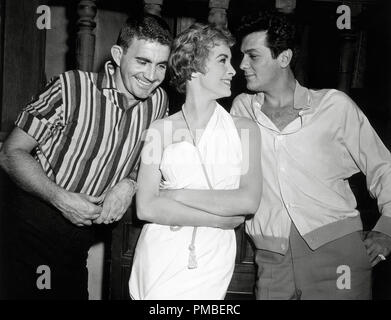 Director Blake Edwards with married Hollywood couple, Janet Leigh and Tony Curtis, on the set of Edwards' film, 'The Perfect Furlough' (1958) Universal Pictures   File Reference # 33371 930THA Stock Photo