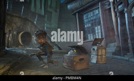 (L to R) Eggs (voiced by Isaac Hempstead Wright), Shoe and Fish try to escape from the Red Hats in LAIKA and Focus Features' family event movie THE BOXTROLLS Stock Photo