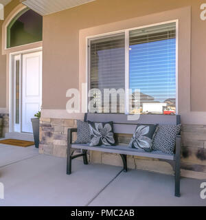 Covered front patio of a house in Utah Stock Photo