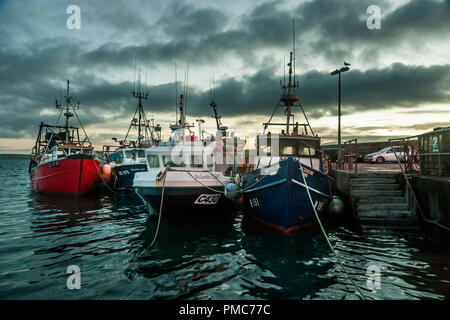 Ballycotton, Cork, Ireland. 22nd July, 2017. A part of the Ballycotton fishing fleet tied up at the pier before dawn at Ballycotton  Co. Cork, Ireland Stock Photo