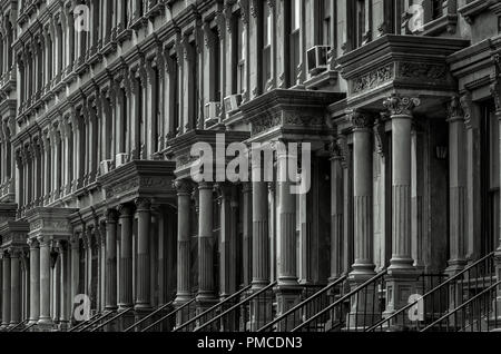 Row of Brownstone Houses in Malcolm X Boulevard, Harlem (New York) Stock Photo