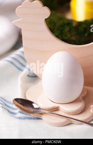 a festive Easter table, an egg serving and serving option Stock Photo