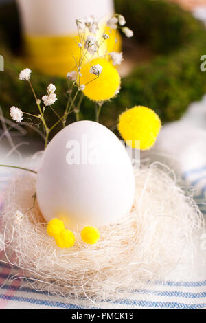 a festive Easter table, an egg serving and serving option Stock Photo