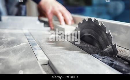 Workshop with tools and electric saws in the process Stock Photo