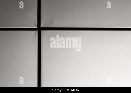 Metal paneling on a wall with clear curved boundaries. Stock Photo