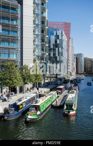 Offices and narrow boats on Paddington Basin, London, UK Stock Photo