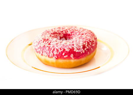 Brightly pink donut on white background Stock Photo