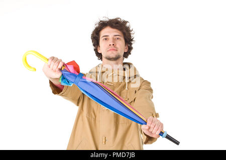 Young man keeping his umbrella Stock Photo
