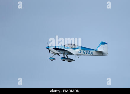 A two seat Van's RV-6A private aircraft leaving Inverness Dalcross airport on its flight south to North Weald Essex. Stock Photo