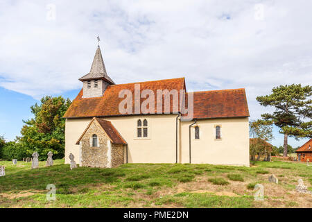 Surrey heritage: small, historic Wisley Church and churchyard in the village of Wisley, Surrey, UK which dates back to Norman times in about 1150 Stock Photo