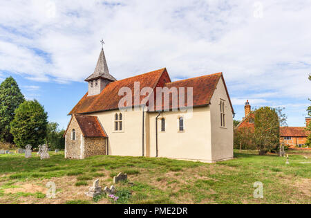 Surrey heritage: small, historic Wisley Church and churchyard in the village of Wisley, Surrey, UK which dates back to Norman times in about 1150 Stock Photo