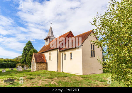 Surrey heritage: small, historic Wisley Church and churchyard in the village of Wisley, Surrey, UK which dates back to Norman times in about 1150 Stock Photo