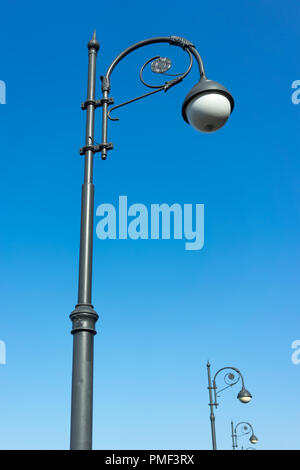 A decorated street lamp, blue sky in the background. for design and networking Stock Photo