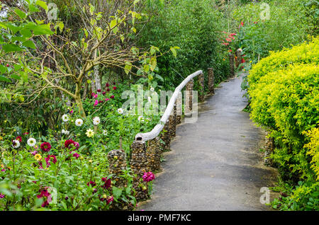 Pathway in a colorful landscape formal garden Stock Photo